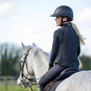 girl  on grey horse