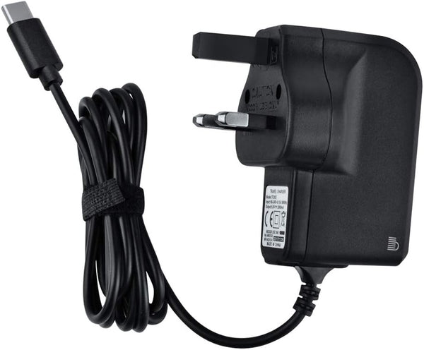 Black USB-C power adapter with a coiled cable and UK three-pin plug on a white background.