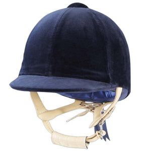 Navy blue velvet riding helmet with gold chin strap on a white background